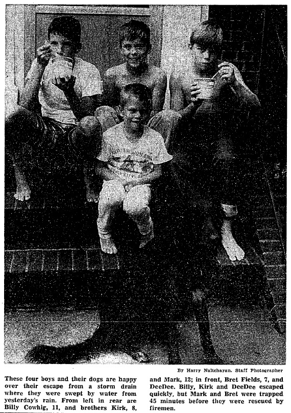 Four boys who escaped being swept into a storm sewer near Timber Branch Parkway, 1965