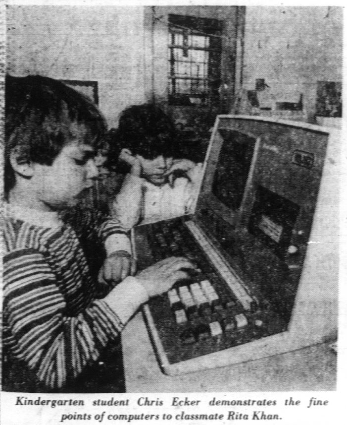 Maury School students use a computer at the school science fair, 1979